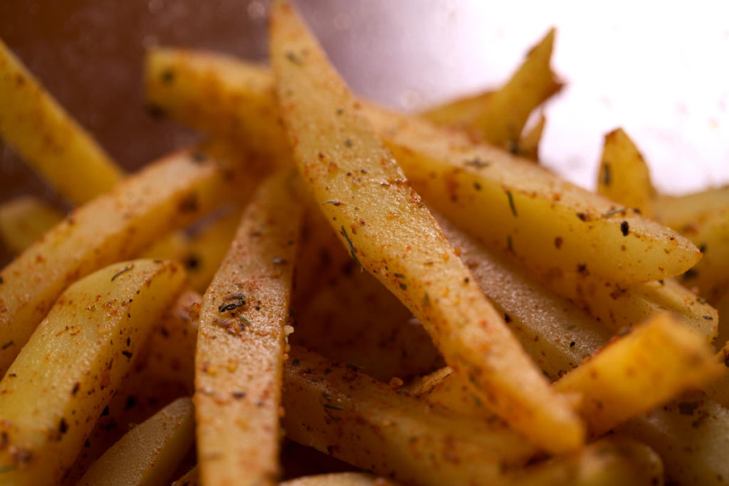 Fries coated with spices